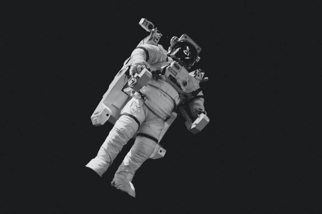 How can astronauts avoid muscular atrophy during space travel?