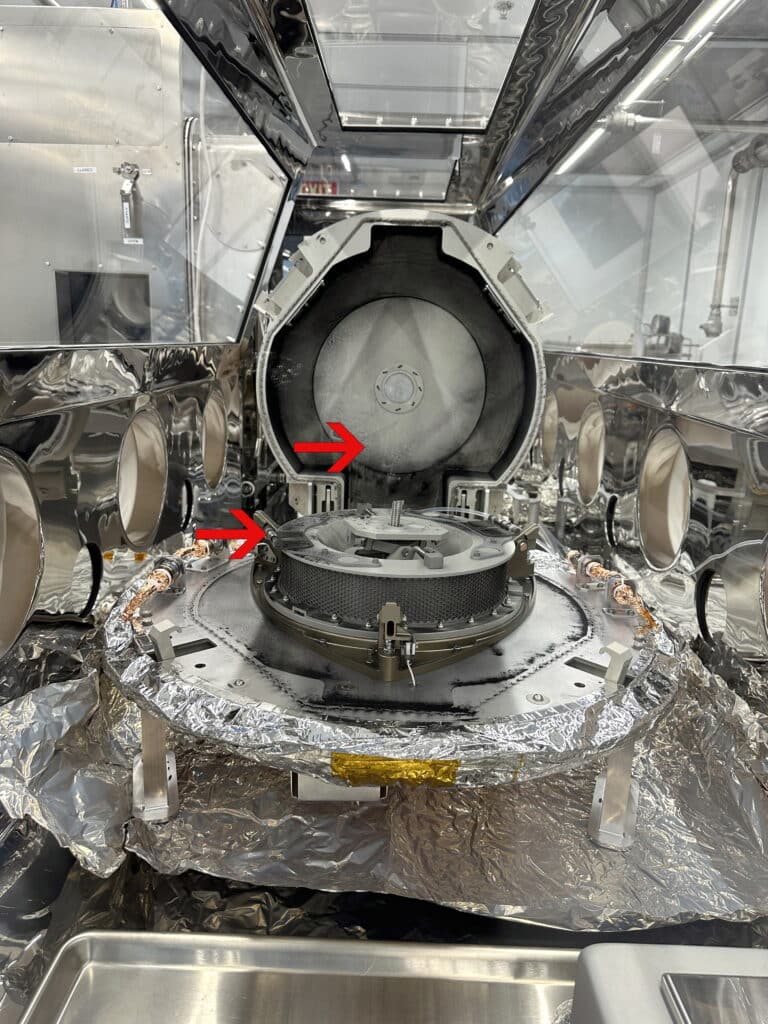 Scientists opened the OSIRIS-REx science canister at NASA's Johnson Space Center in Houston on Tuesday, Sept. 26, and spotted "black dust and debris" 