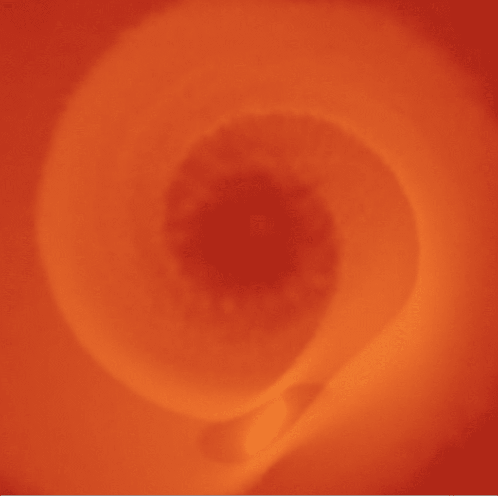 A hot jupiter planet is pushed to its star too close and starts to evaporate, shedding its outer layers into the surrounding disc.
