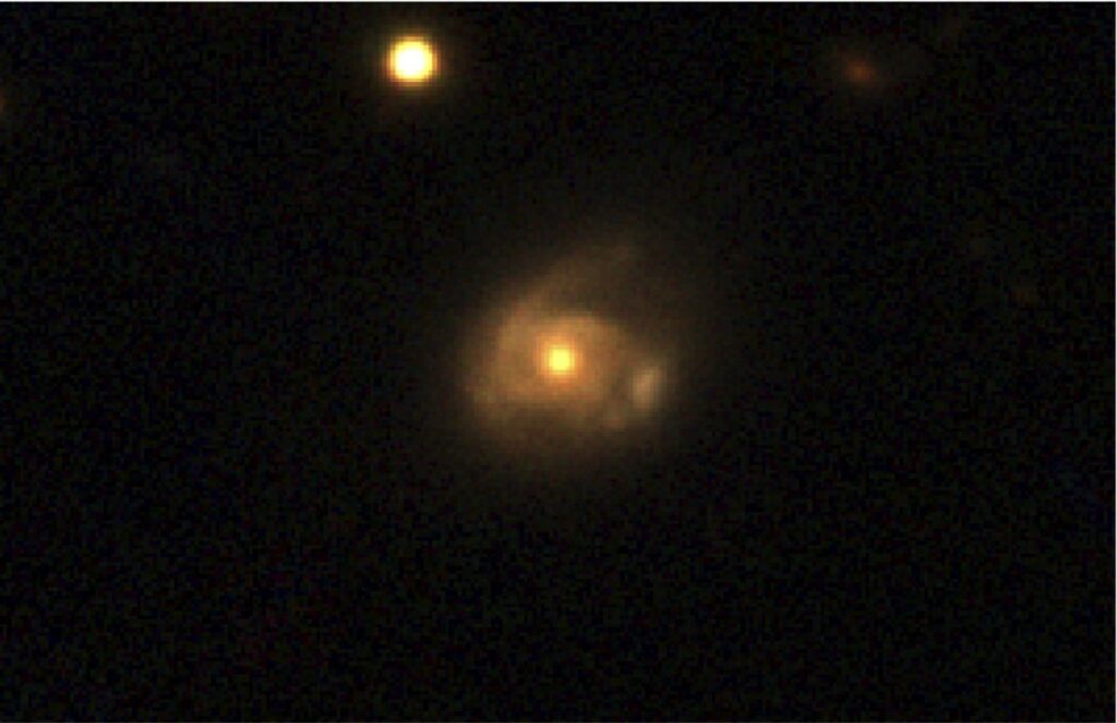 Swift J0230 occurred over 500 million light-years away in a galaxy named 2MASX J02301709+2836050, captured here by the Pan-STARRS telescope in Hawaii.
