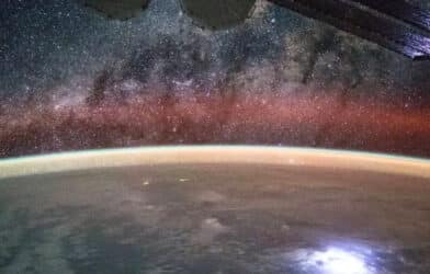 This image taken from the International Space Station shows swaths of airglow hovering in Earth’s atmosphere