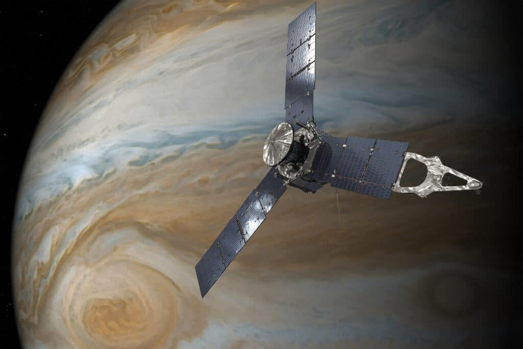 Illustration depicts NASA's Juno spacecraft in orbit above Jupiter.