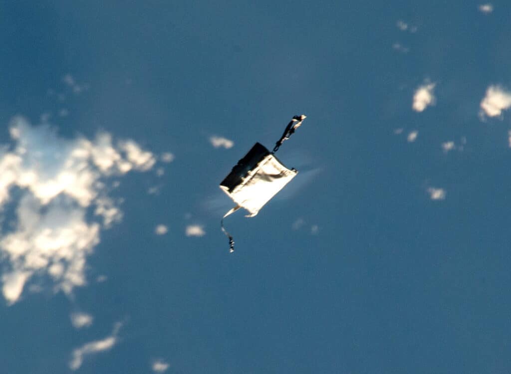 NASA tool bag orbiting Earth.