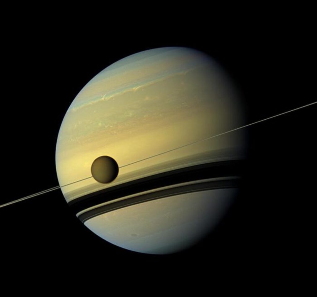 Titan orbits Saturn