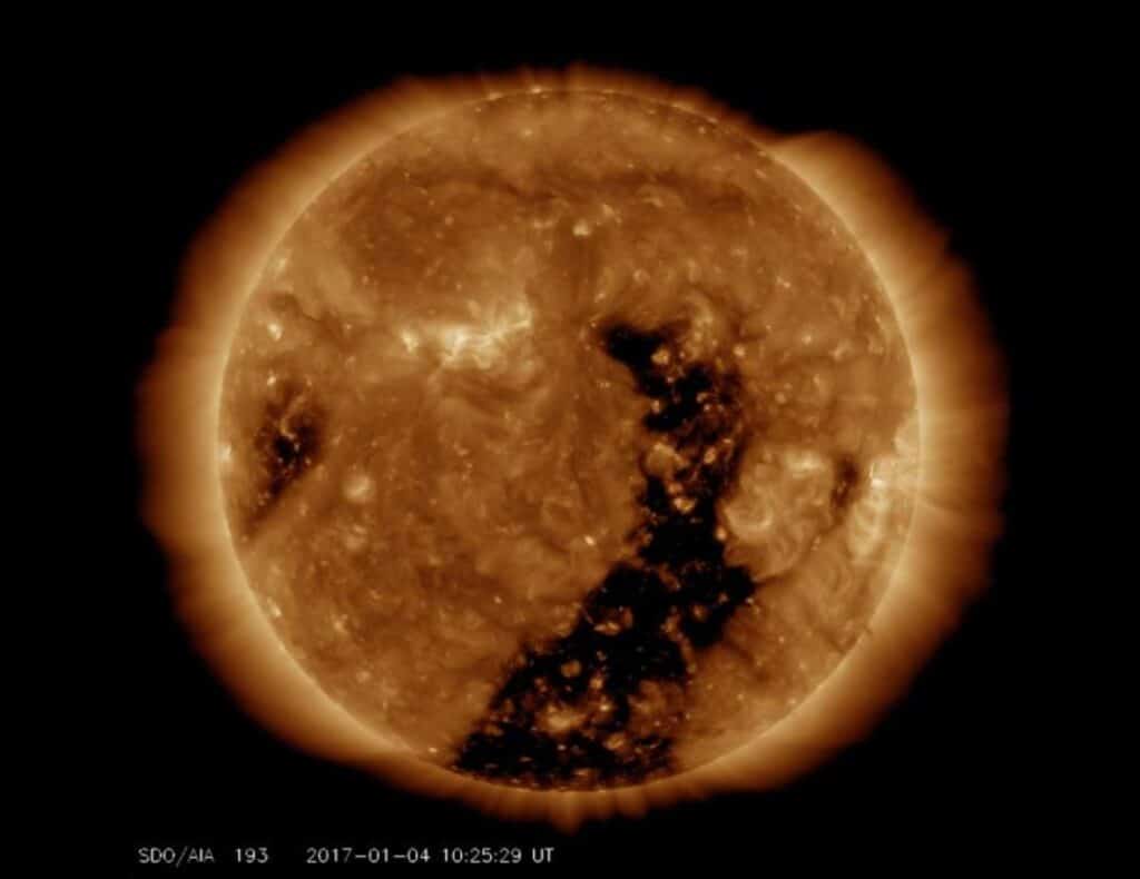 An elongated coronal hole rotated across the face of the sun in January 2017, streaming solar wind toward Earth
