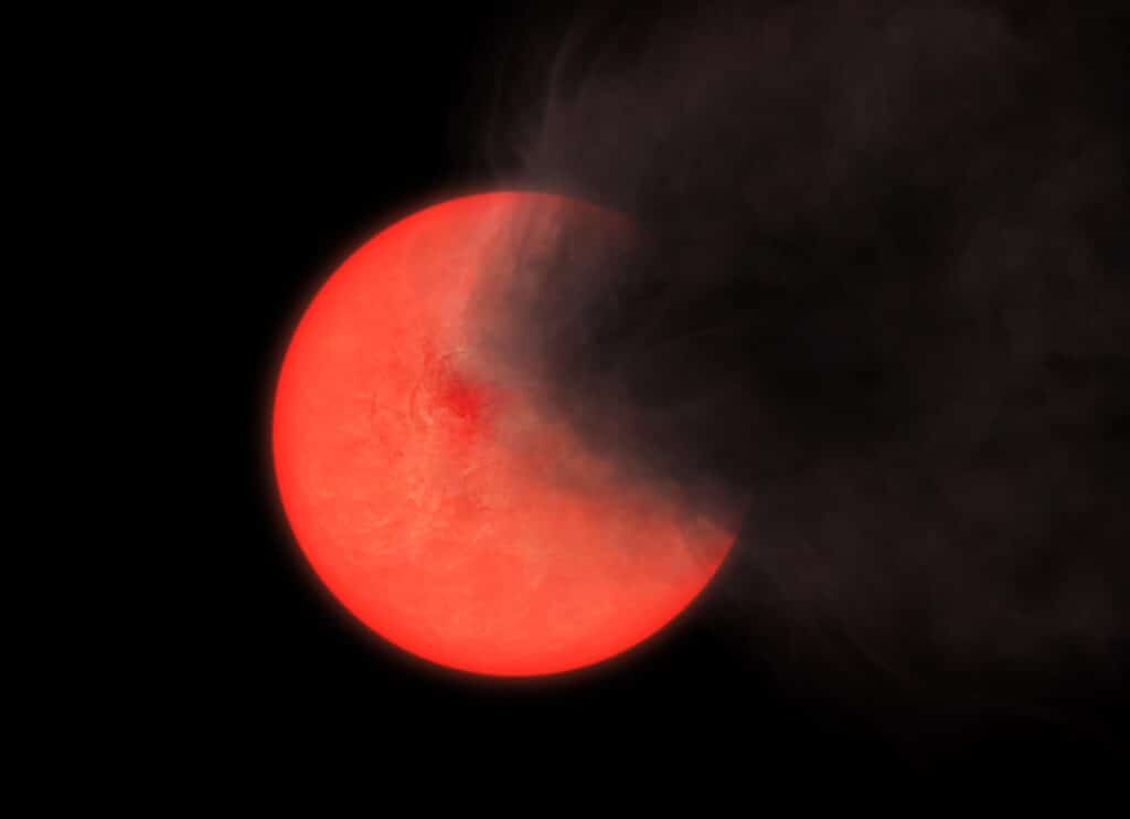 Artist’s impression of a cloud of smoke and dust being thrown out by a red giant star