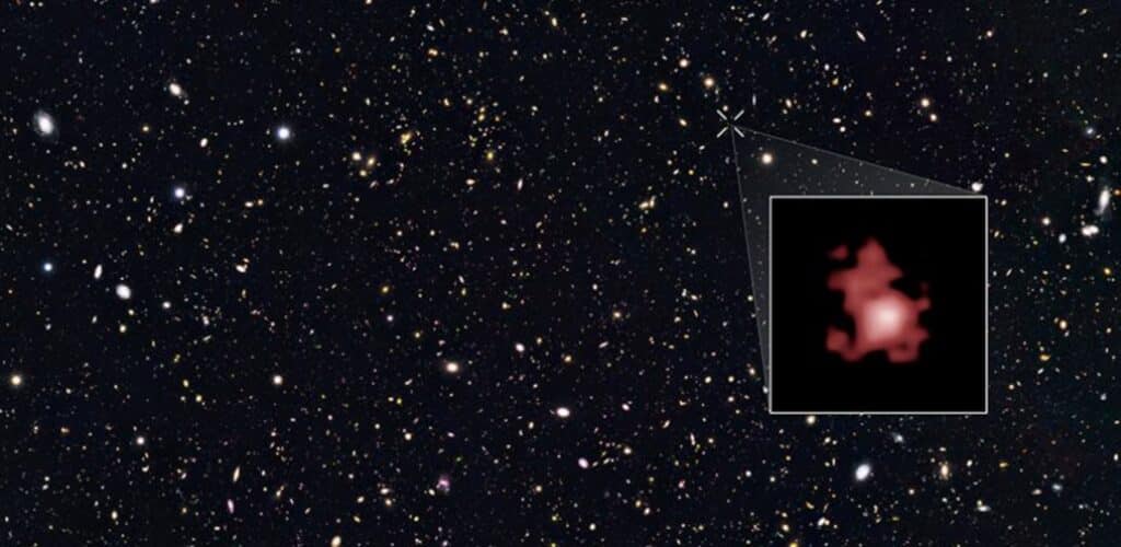 Researchers have discovered the oldest black hole ever observed, dating from the dawn of the universe, and found that it is "eating" its host galaxy to death