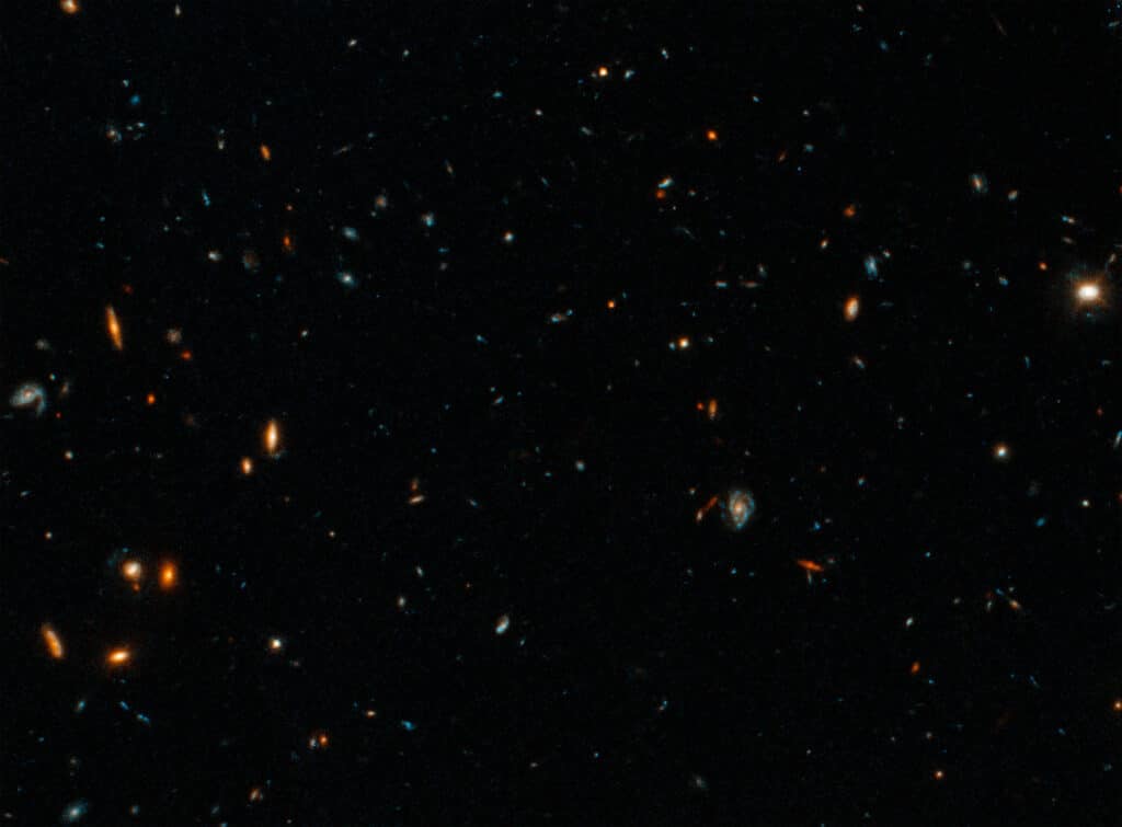 A Hubble Space Telescope image of the host galaxy of an exceptionally powerful fast radio burst, FRB 20220610A