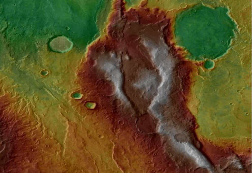 Topographic data are draped over infrared image data showing complex tectonic structures and volcanic deposits in the Eridania region of Mars