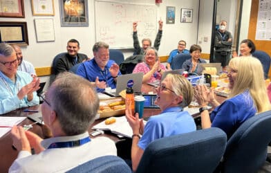 After receiving data about the health and status of Voyager 1 for the first time in five months, members of the Voyager flight team celebrate in a conference room at NASA’s Jet Propulsion Laboratory on April 20.