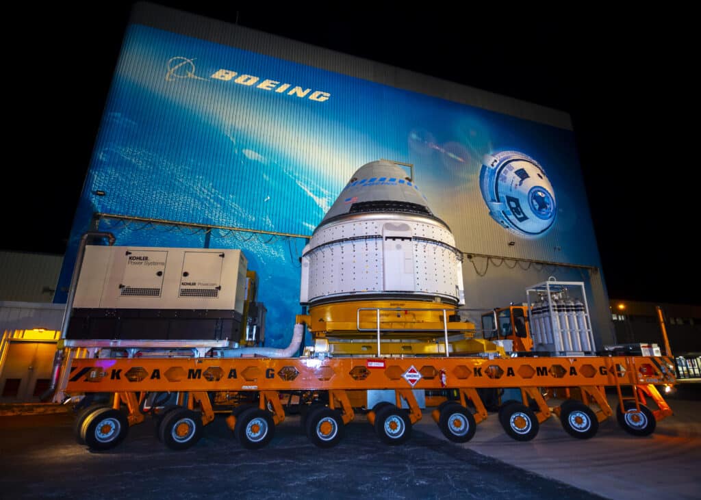 The Boeing CST-100 Starliner spacecraft rolls out from the company’s Commercial Crew and Cargo Processing Facility at NASA’s Kennedy Space Center in Florida.