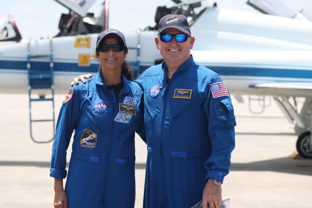 From left to right, NASA astronauts Suni Williams and Butch Wilmore pose for photos at the Launch and Landing Facility at NASA’s Kennedy Space Center in Florida following their arrival for the agency’s Boeing Crew Flight Test.